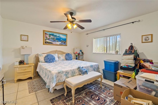 bedroom featuring light tile patterned flooring and ceiling fan