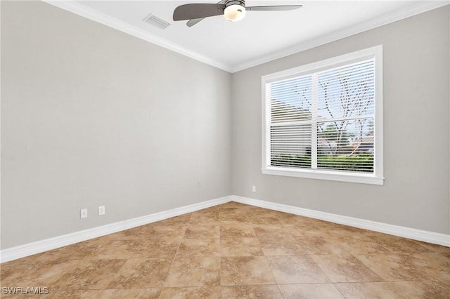 spare room featuring a ceiling fan, visible vents, crown molding, and baseboards