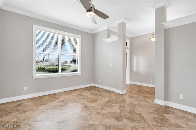 spare room featuring ceiling fan, baseboards, and crown molding