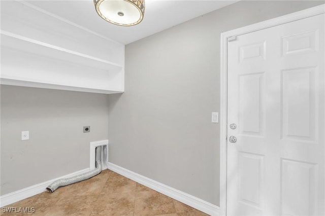 laundry room featuring laundry area, light tile patterned flooring, electric dryer hookup, and baseboards