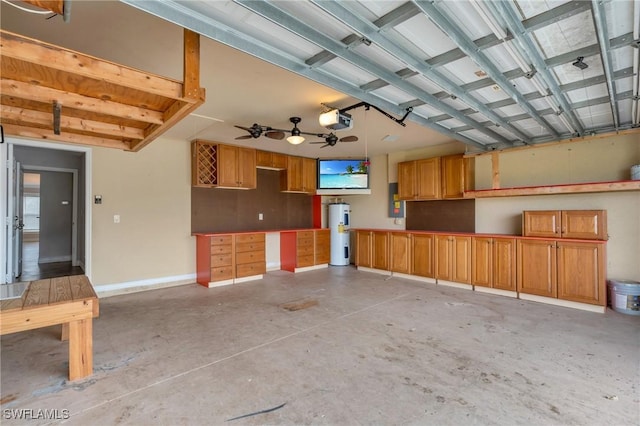 garage featuring electric panel, baseboards, a ceiling fan, a garage door opener, and water heater