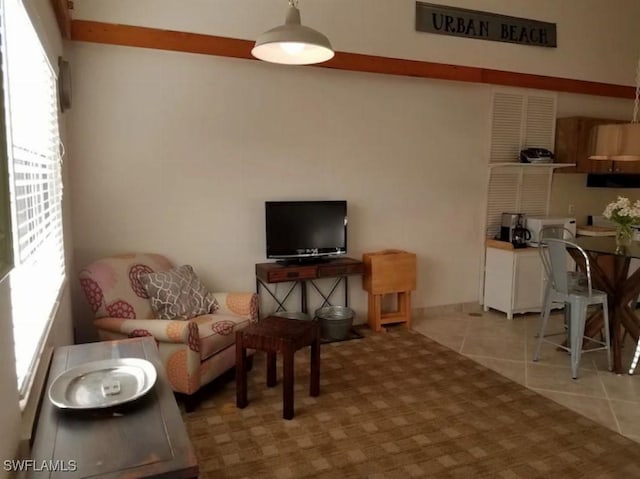 living room with light tile patterned flooring