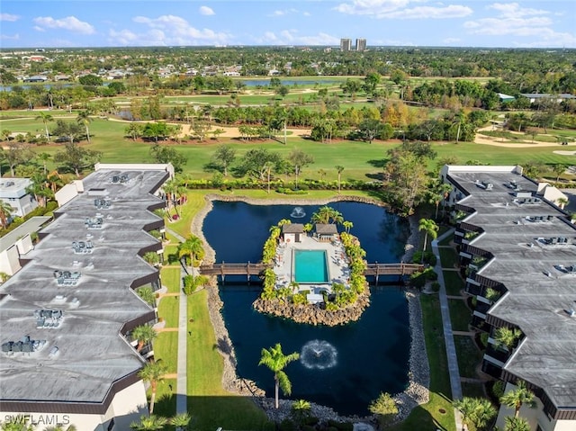 aerial view featuring golf course view and a water view