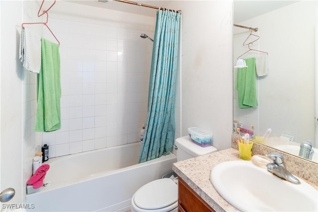 bathroom featuring shower / tub combo, vanity, and toilet