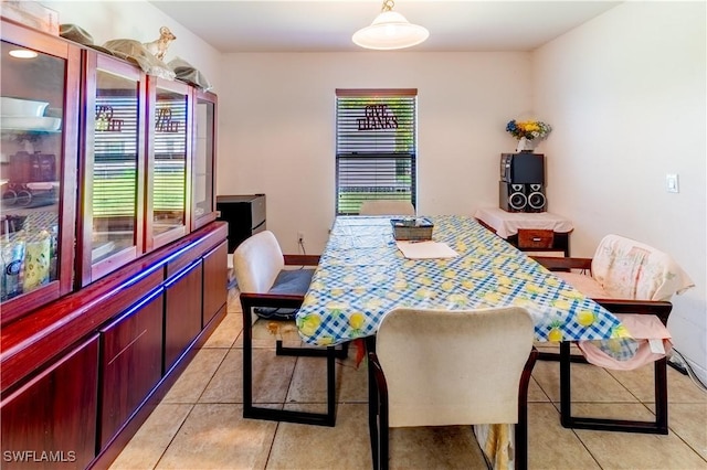 dining room featuring light tile patterned floors