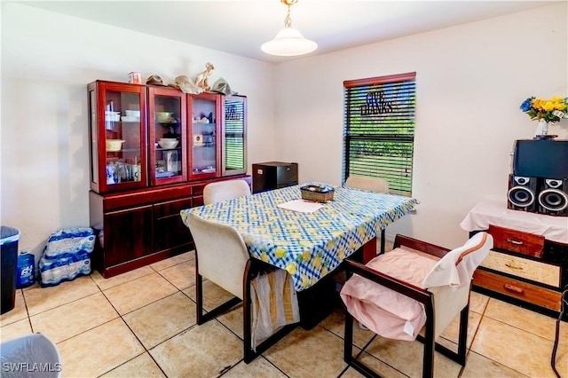 dining area featuring light tile patterned floors