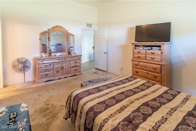 bedroom featuring carpet floors and visible vents