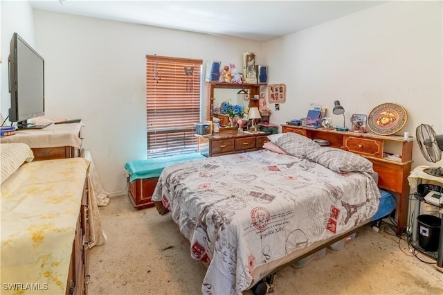 bedroom with light carpet