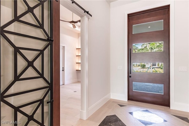 foyer entrance with baseboards