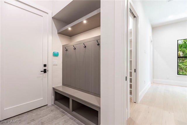 770 Port Side Dr, Naples, FL 34103 - mudroom with light wood-style floors and recessed lighting