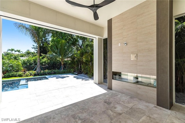 view of patio / terrace with an outdoor pool