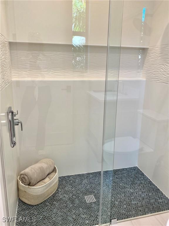 770 Port Side Dr, Naples, FL 34103 - bathroom featuring a stall shower