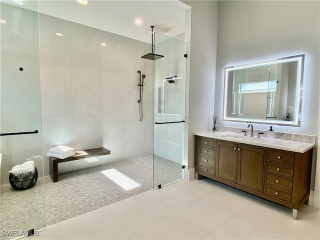 770 Port Side Dr, Naples, FL 34103 - bathroom with walk in shower, vanity, and tile patterned floors