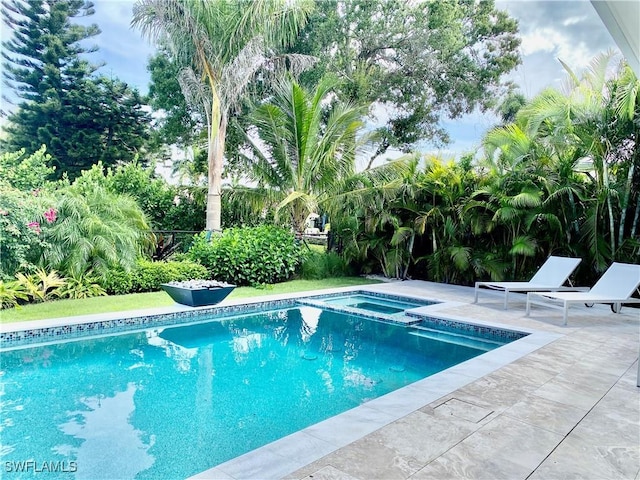 770 Port Side Dr, Naples, FL 34103 - view of pool featuring a patio and a pool with connected hot tub