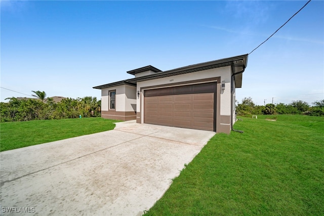 view of front facade featuring concrete driveway, a front lawn, an attached garage, and stucco siding