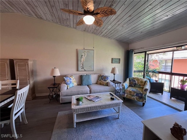 living room featuring lofted ceiling, wood ceiling, baseboards, and wood finished floors