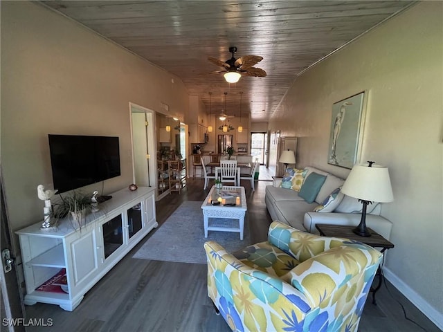 living area with dark wood finished floors, vaulted ceiling, ceiling fan, wooden ceiling, and baseboards