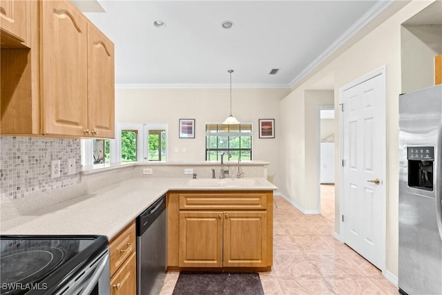 kitchen featuring appliances with stainless steel finishes, crown molding, a sink, and a peninsula