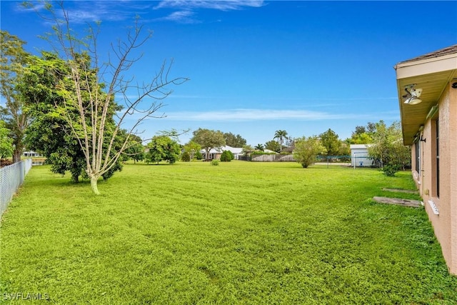 view of yard with fence