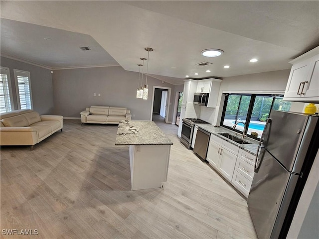 6048 Birnam Wood Ln, Fort Myers, FL 33908 - kitchen featuring open floor plan, stainless steel appliances, a sink, and visible vents