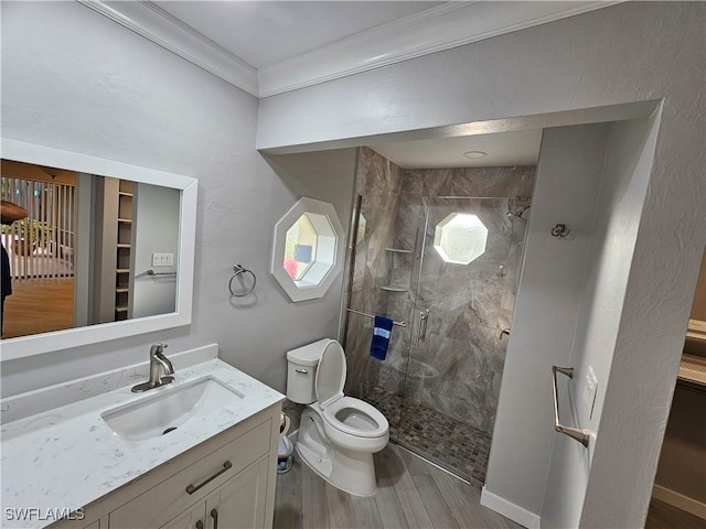 6048 Birnam Wood Ln, Fort Myers, FL 33908 - full bathroom featuring toilet, wood finished floors, vanity, a stall shower, and crown molding