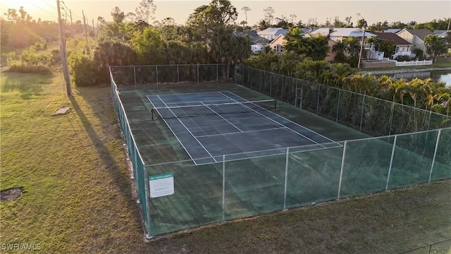6048 Birnam Wood Ln, Fort Myers, FL 33908 - view of sport court with a residential view and fence