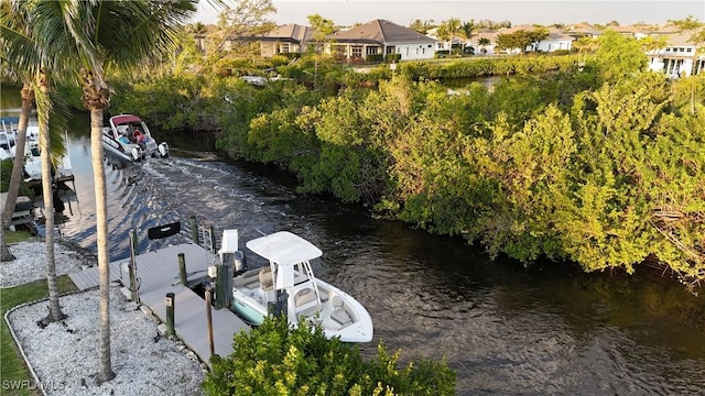 6048 Birnam Wood Ln, Fort Myers, FL 33908 - exterior space featuring a dock and boat lift