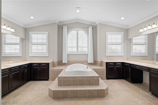 bathroom featuring lofted ceiling, a garden tub, crown molding, and tile patterned floors