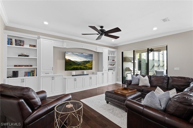 living room featuring dark wood-type flooring, crown molding, and a ceiling fan