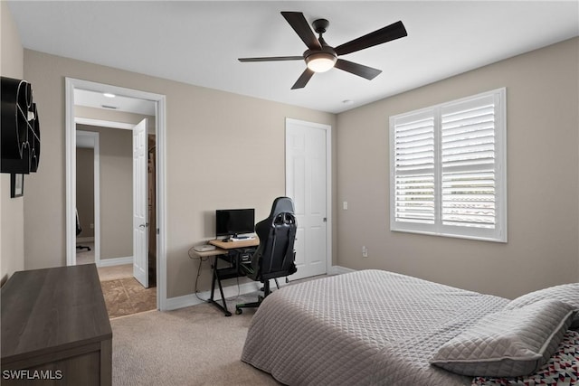 bedroom with carpet, ceiling fan, and baseboards