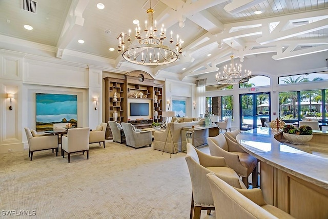 living area featuring visible vents, a decorative wall, an inviting chandelier, light carpet, and beamed ceiling