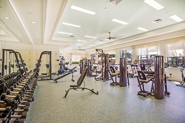 gym featuring a healthy amount of sunlight and visible vents