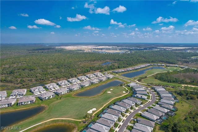 43333 Water Bird Way Unit 4821, Punta Gorda, FL 33982 - aerial view of property's location featuring nearby suburban area, a large body of water, a local golf course, and a heavily wooded area