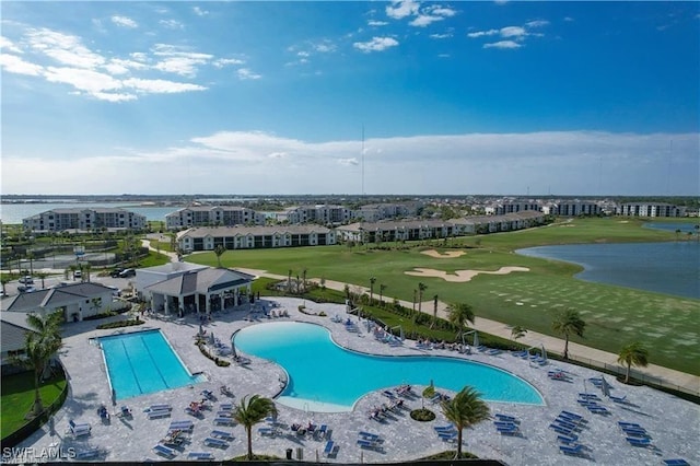43333 Water Bird Way Unit 4821, Punta Gorda, FL 33982 - community pool featuring view of golf course, a water view, and a patio area