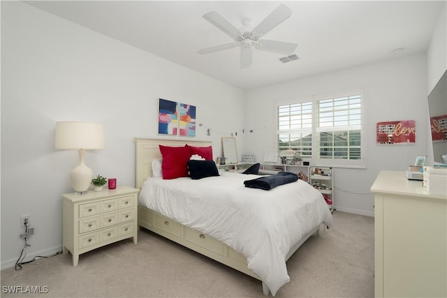 43333 Water Bird Way Unit 4821, Punta Gorda, FL 33982 - bedroom with light colored carpet, baseboards, and ceiling fan