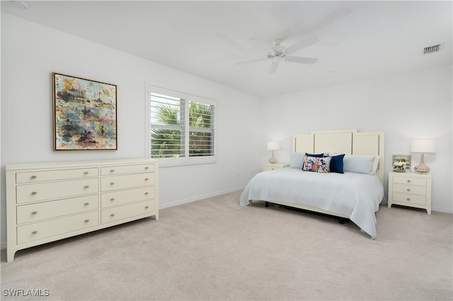 43333 Water Bird Way Unit 4821, Punta Gorda, FL 33982 - bedroom with light carpet, baseboards, and a ceiling fan