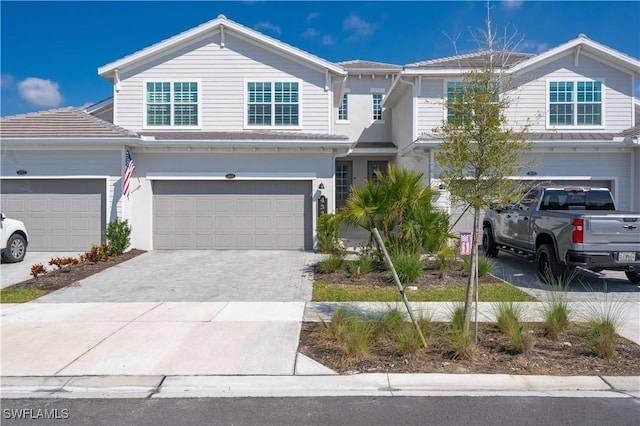 43333 Water Bird Way Unit 4821, Punta Gorda, FL 33982 - view of front facade featuring a garage and driveway
