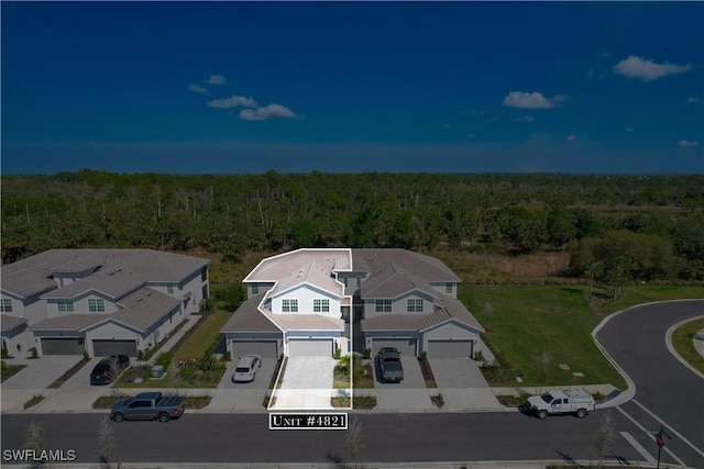 43333 Water Bird Way Unit 4821, Punta Gorda, FL 33982 - view from above of property with a heavily wooded area