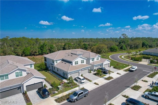 43333 Water Bird Way Unit 4821, Punta Gorda, FL 33982 - aerial view of property and surrounding area featuring a heavily wooded area