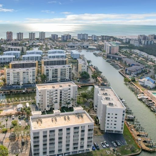 aerial view with a view of city and a water view