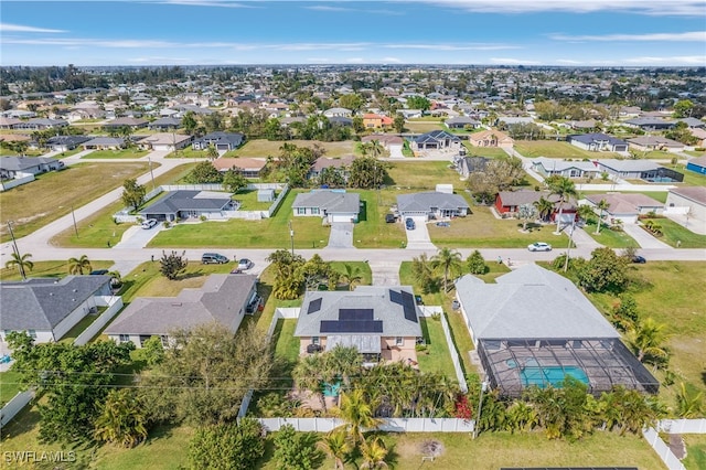 birds eye view of property with a residential view