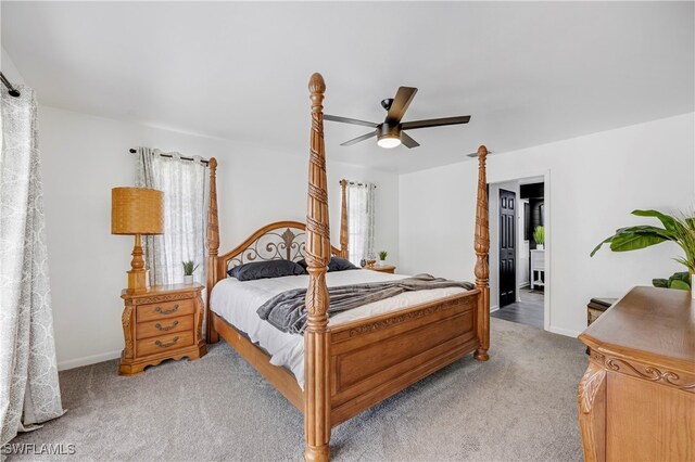 bedroom featuring carpet flooring, a ceiling fan, and baseboards