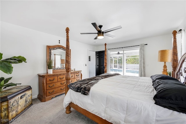 bedroom with access to outside, carpet floors, and a ceiling fan