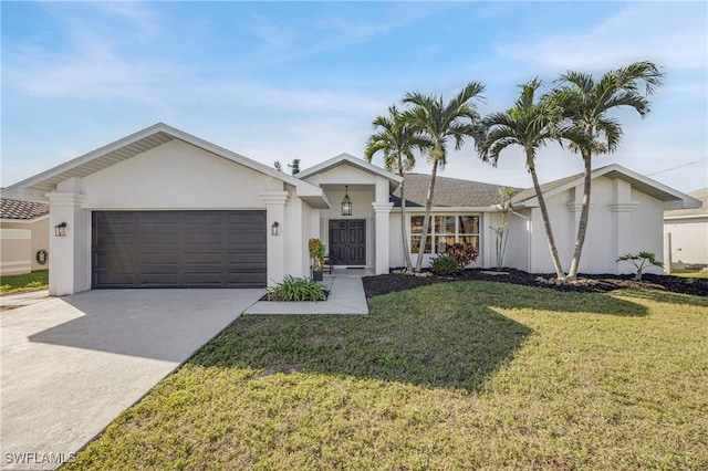 view of front of property featuring driveway, a front lawn, an attached garage, and stucco siding