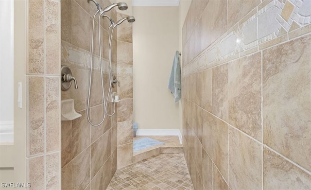 bathroom with tiled shower