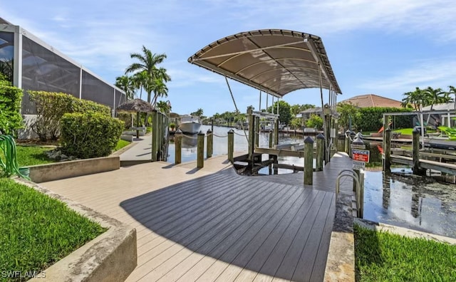 view of dock with a water view and boat lift