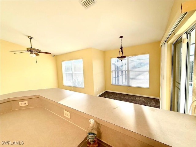 kitchen with visible vents and pendant lighting