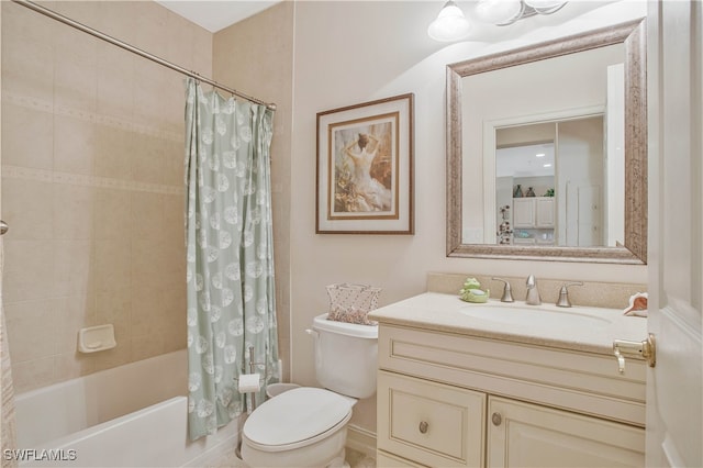 full bath with vanity, toilet, and shower / bath combo with shower curtain