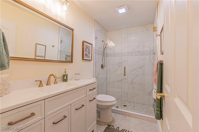 full bath with a shower stall, toilet, and vanity