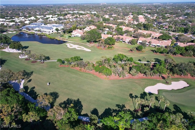 bird's eye view with a residential view, a water view, and golf course view